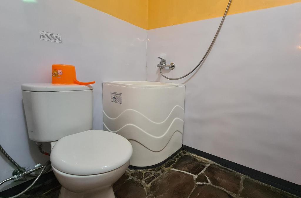 Koupelna v ubytování Dewi Sri Guesthouse