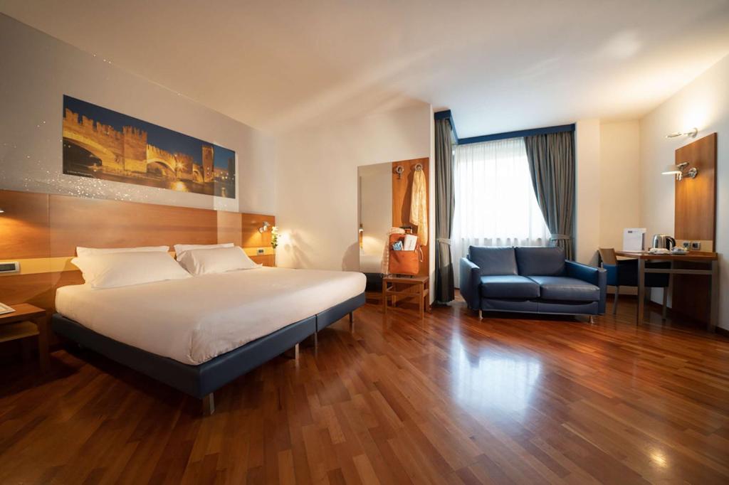 Postel nebo postele na pokoji v ubytování Best Western Hotel Fiera Verona