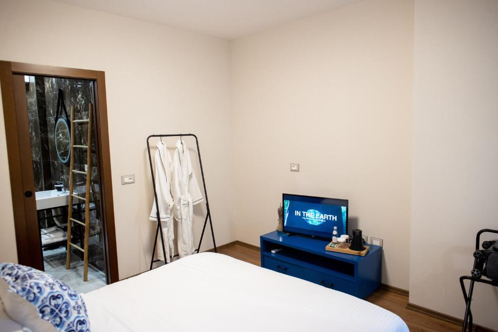 Postel nebo postele na pokoji v ubytování Terra'Vista Apartments