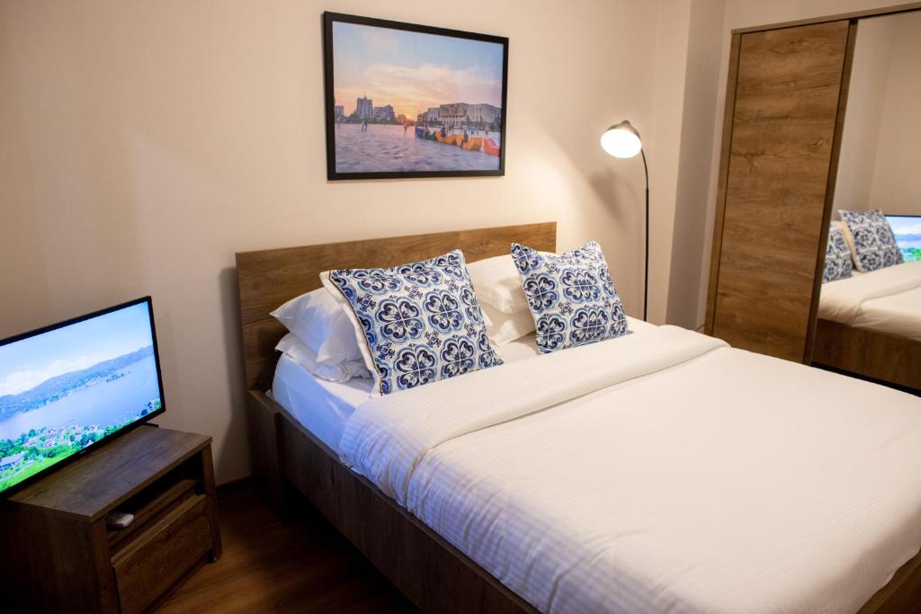 Postel nebo postele na pokoji v ubytování Terra'Vista Apartments