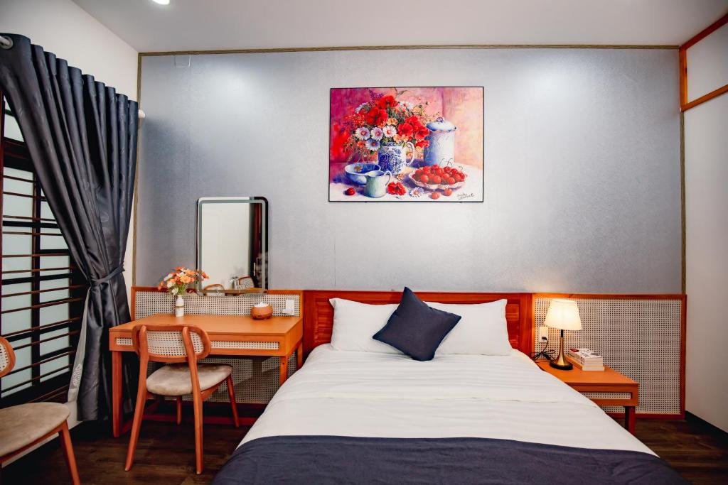 Postel nebo postele na pokoji v ubytování TiboleyHomestay