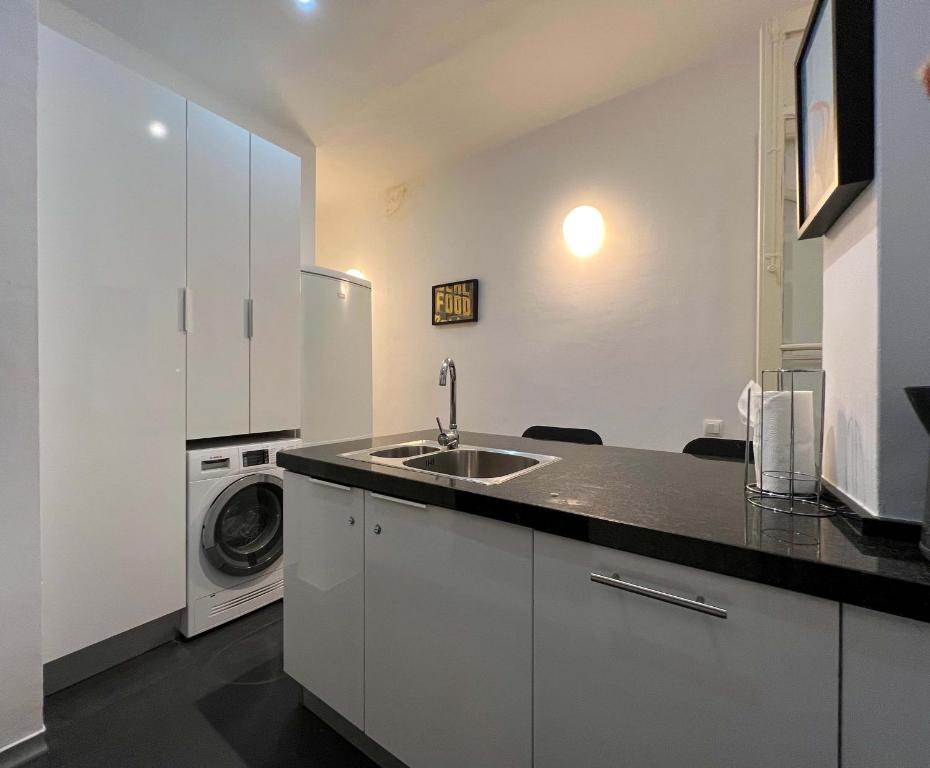 Kuchyň nebo kuchyňský kout v ubytování Stay Unique Apartments Cent