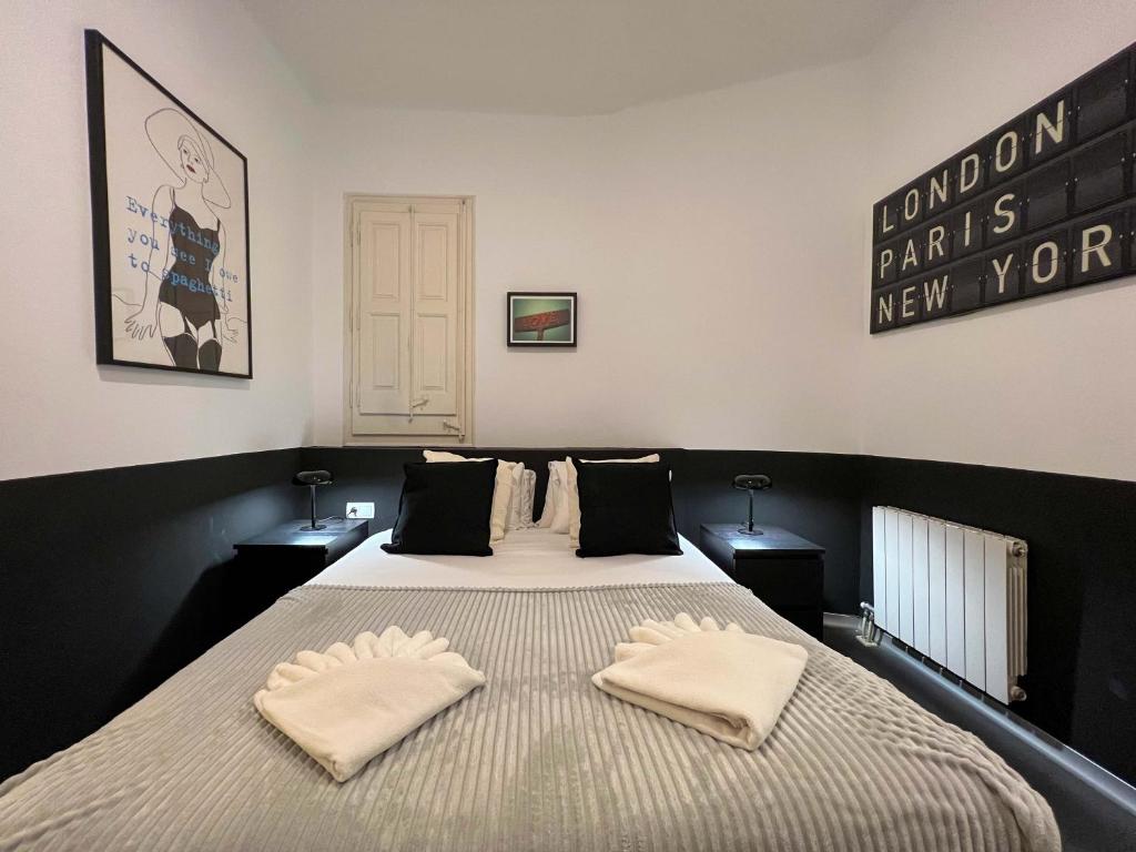 Postel nebo postele na pokoji v ubytování Stay Unique Apartments Cent