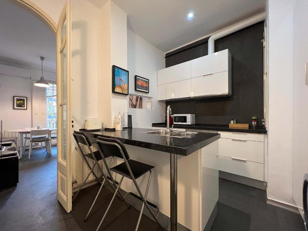 Kuchyň nebo kuchyňský kout v ubytování Stay Unique Apartments Cent