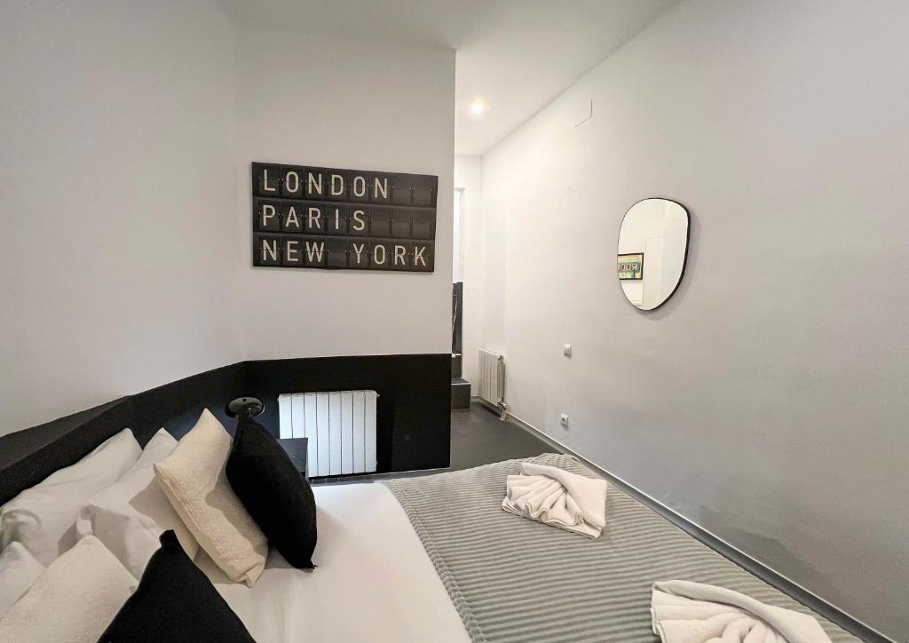 Postel nebo postele na pokoji v ubytování Stay Unique Apartments Cent