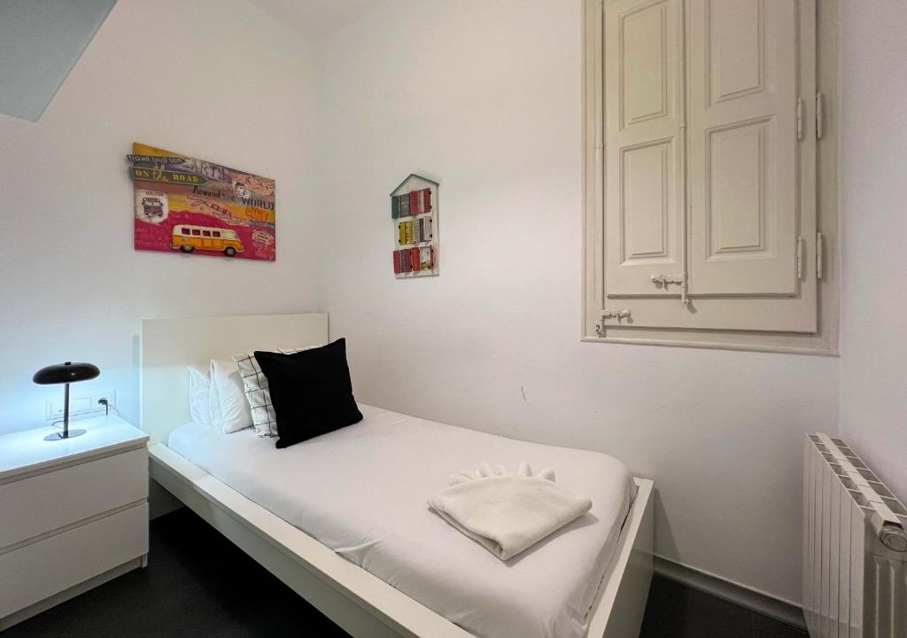 Postel nebo postele na pokoji v ubytování Stay Unique Apartments Cent