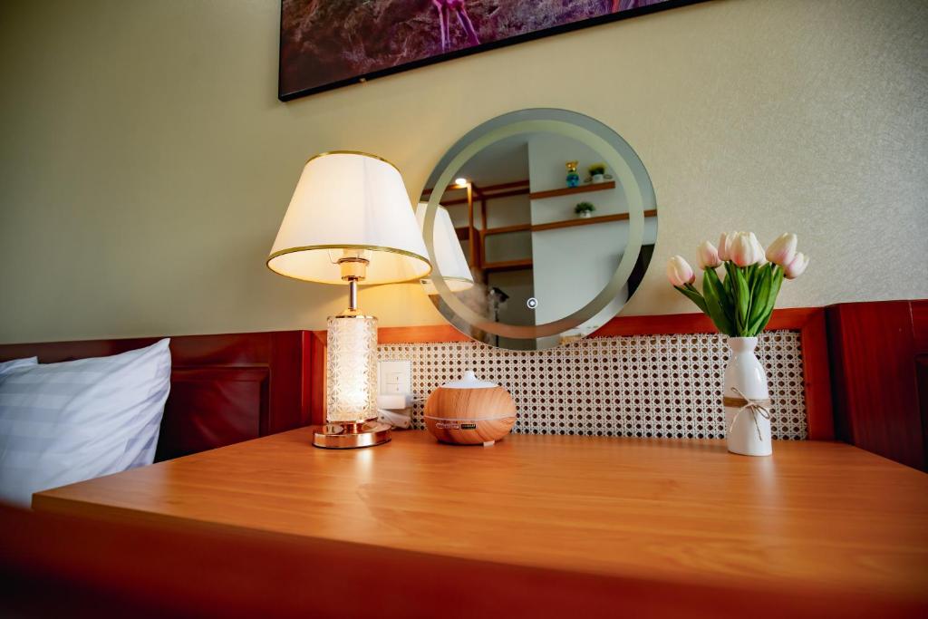 Postel nebo postele na pokoji v ubytování TiboleyHomestay
