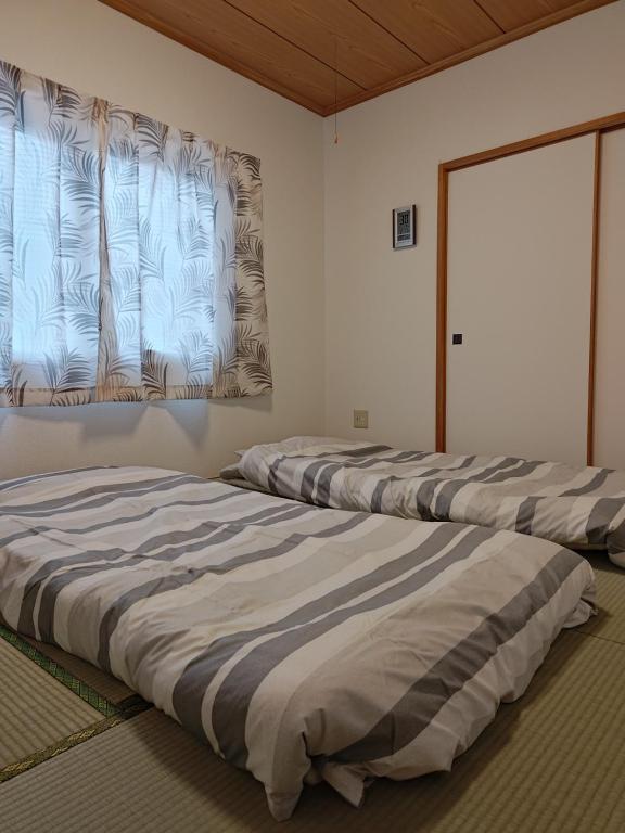 Katil atau katil-katil dalam bilik di Anna's House