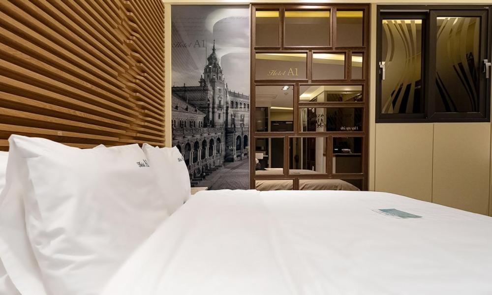 Postel nebo postele na pokoji v ubytování Pohang A1 Hotel Yeongildae Branch