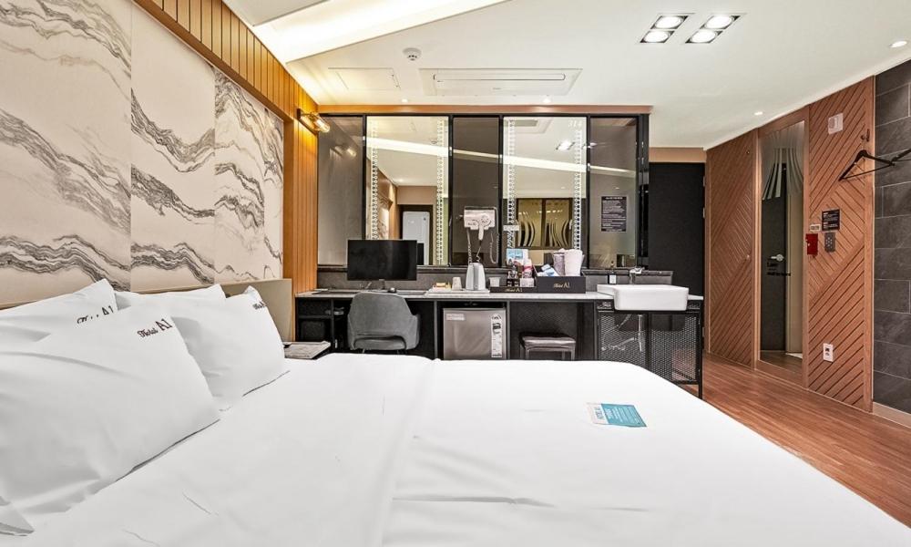 Postel nebo postele na pokoji v ubytování Pohang A1 Hotel Yeongildae Branch