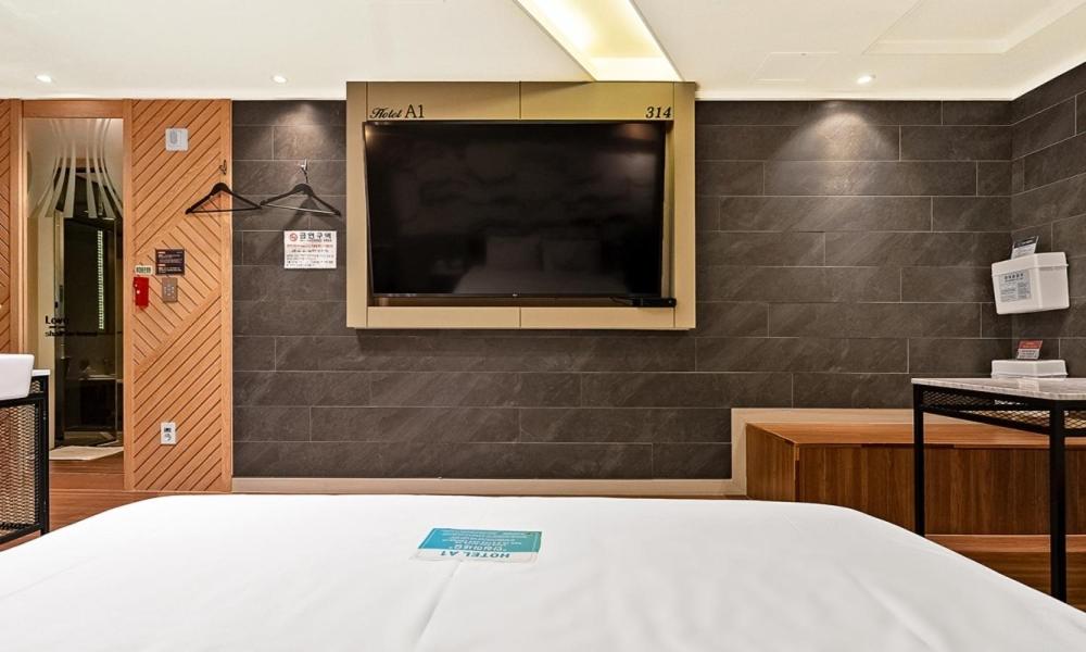 Postel nebo postele na pokoji v ubytování Pohang A1 Hotel Yeongildae Branch