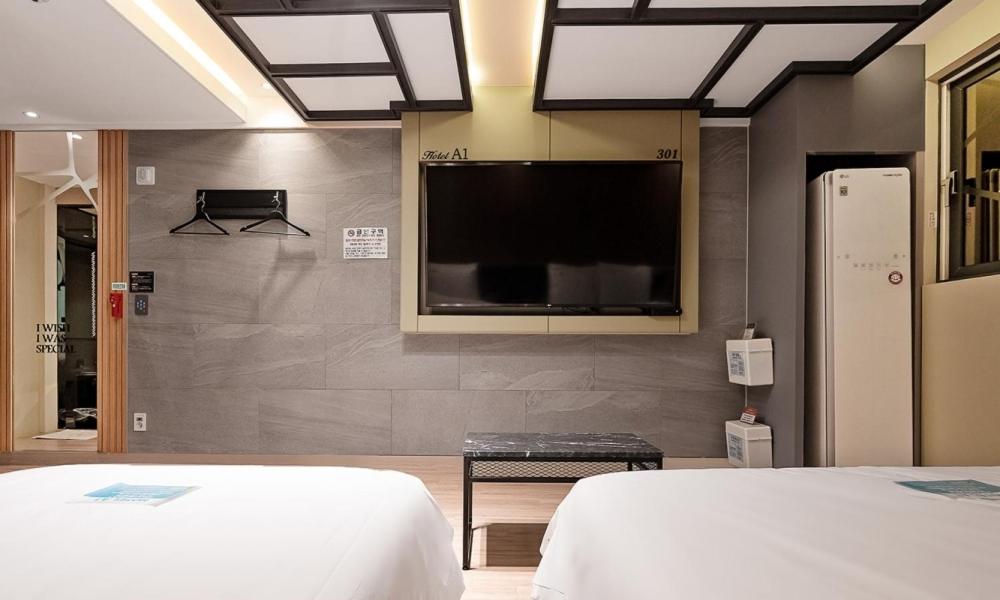 Postel nebo postele na pokoji v ubytování Pohang A1 Hotel Yeongildae Branch