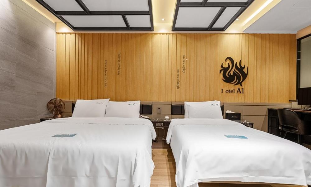 Postel nebo postele na pokoji v ubytování Pohang A1 Hotel Yeongildae Branch
