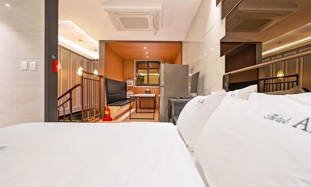 Postel nebo postele na pokoji v ubytování Pohang A1 Hotel Yeongildae Branch