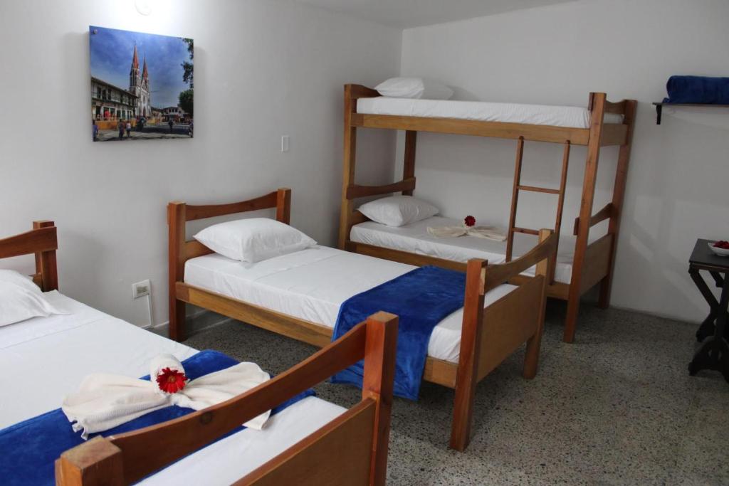 Letto o letti in una camera di Absolute Hotel & Hostel Boutique