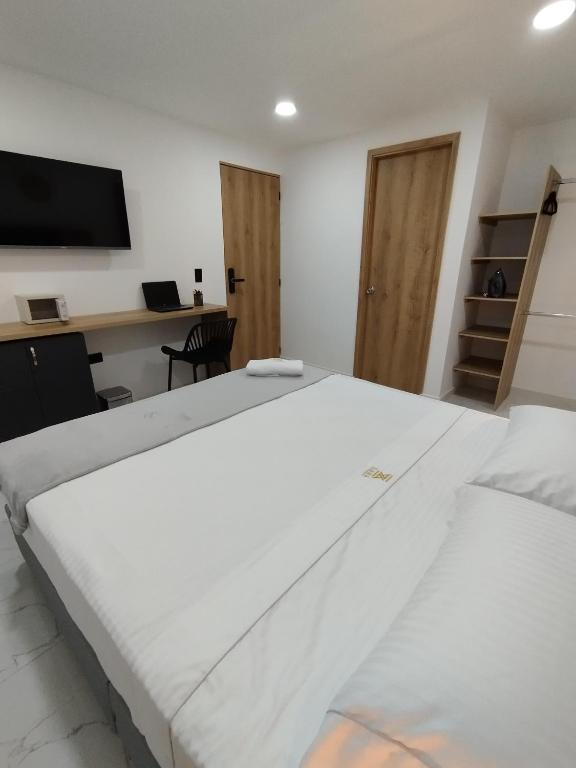 Postel nebo postele na pokoji v ubytování Zamá by Vida