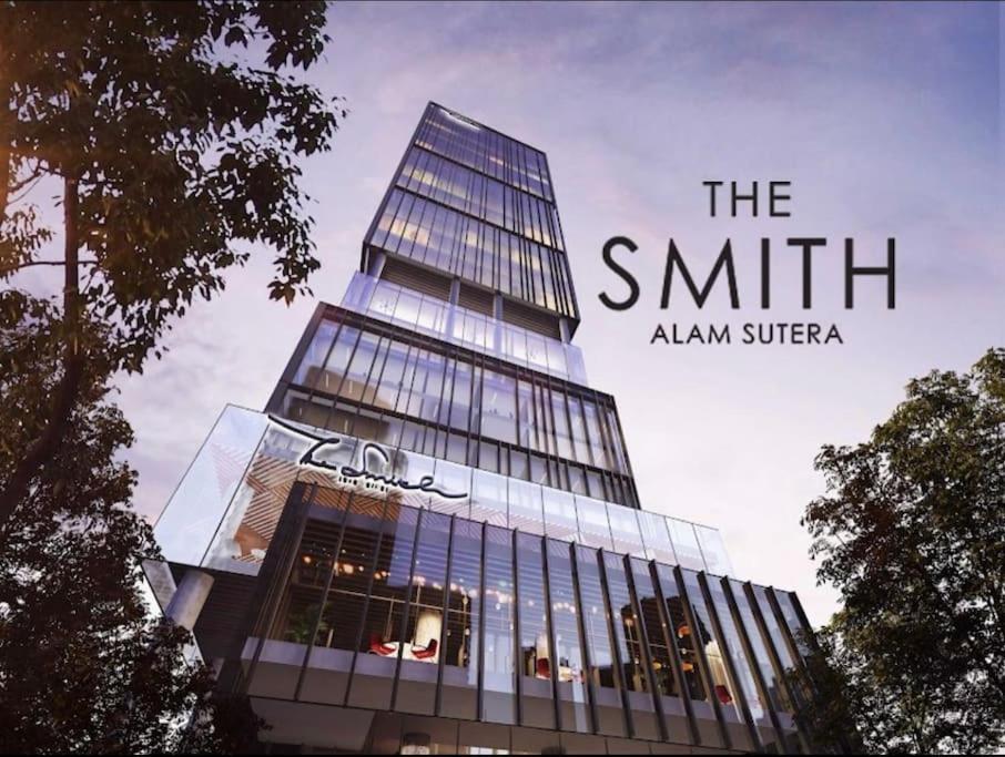 a tall glass building with the smith aliya superagency at Large Comfortable Bedroom in Alam Sutera Tangerang in Kampungklapa 2