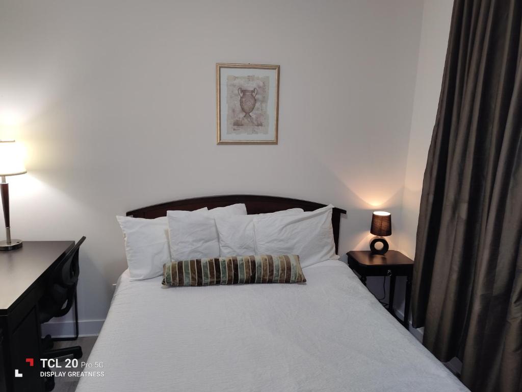 Postel nebo postele na pokoji v ubytování Sweet House B&B