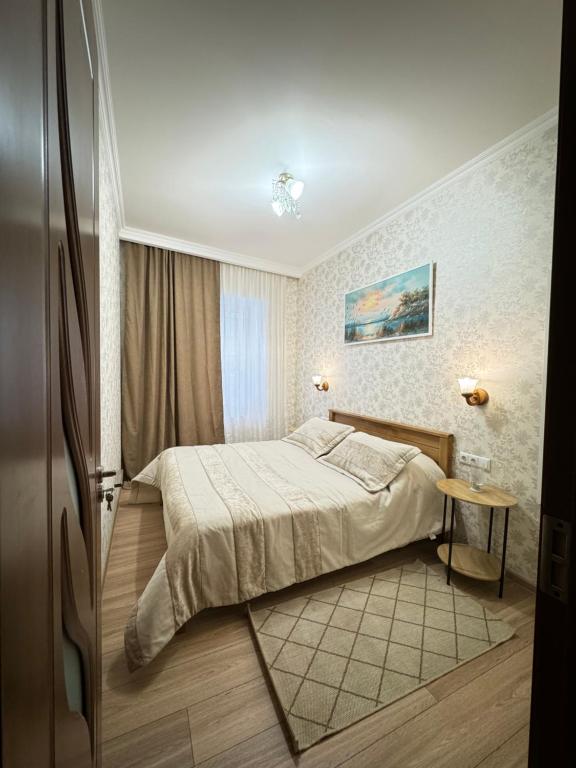 מיטה או מיטות בחדר ב-Nikita's Old Tbilisi