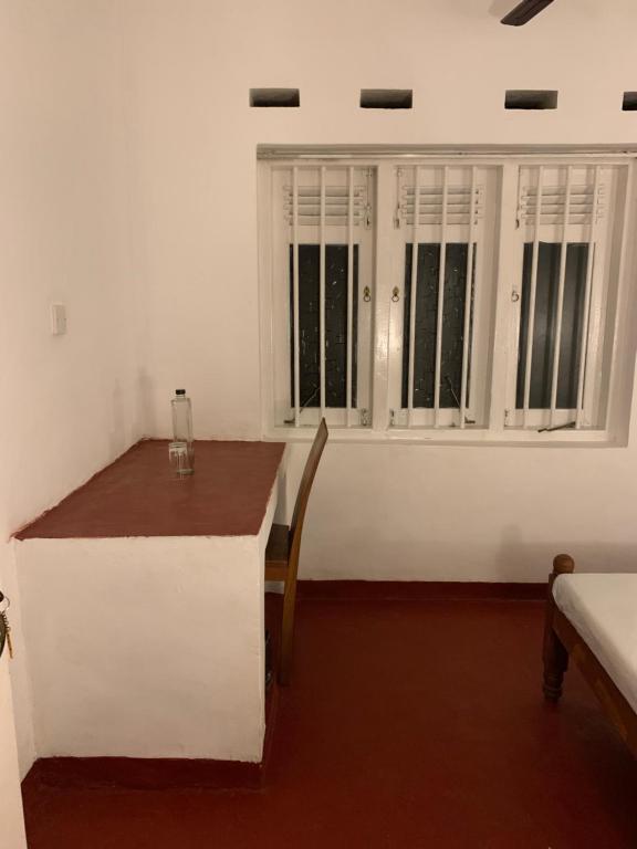 Postel nebo postele na pokoji v ubytování Unrushed Midigama