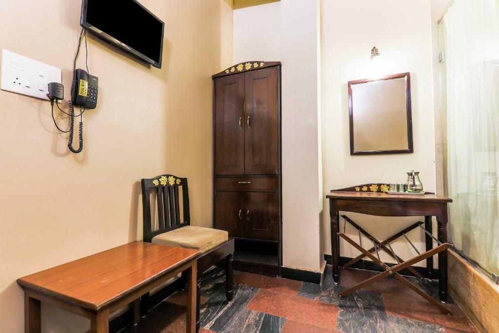 TV a/nebo společenská místnost v ubytování Hotel O Kams Coco De Parra