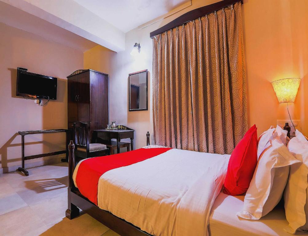 Postel nebo postele na pokoji v ubytování Hotel O Kams Coco De Parra