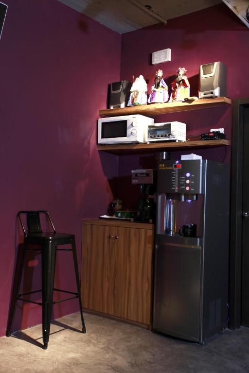 Kuchyň nebo kuchyňský kout v ubytování Backpackers Hostel - Ximen