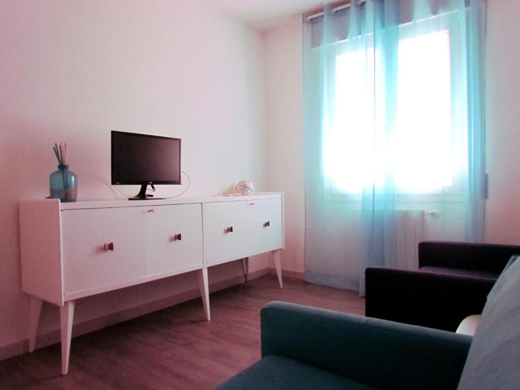 TV a/nebo společenská místnost v ubytování B&B Caorle For You