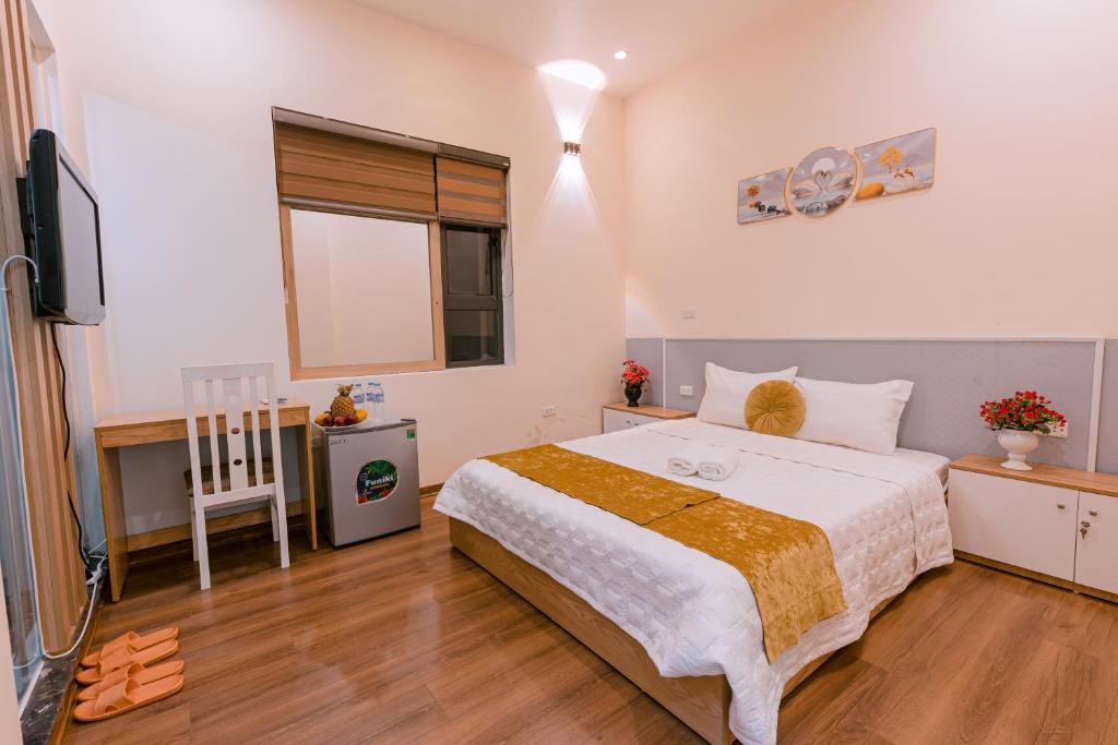 Postel nebo postele na pokoji v ubytování Golden Diamond Hotel