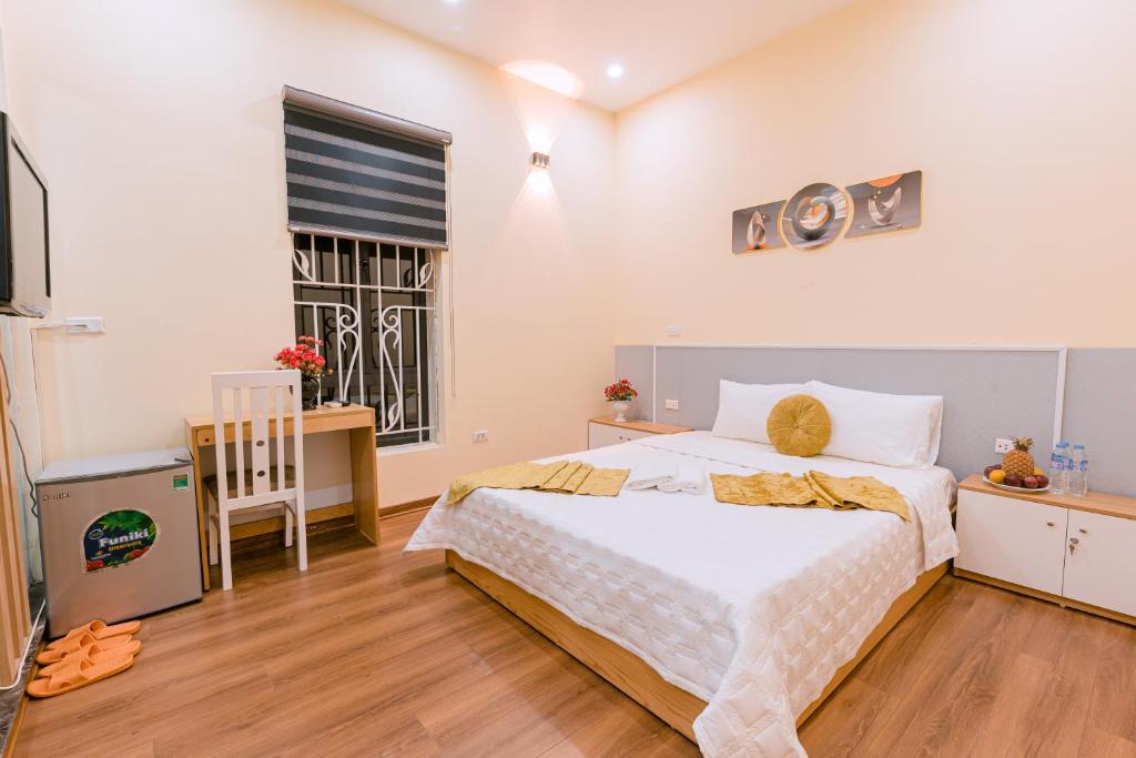 Postel nebo postele na pokoji v ubytování Golden Diamond Hotel
