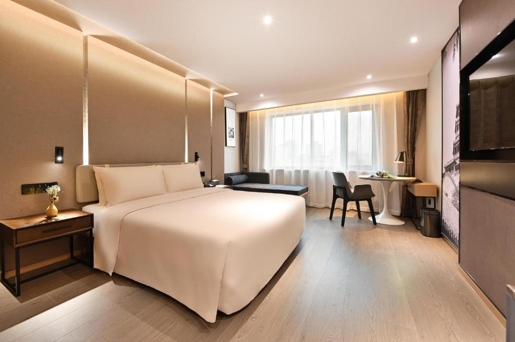 Postel nebo postele na pokoji v ubytování Atour S Hotel Beijing Anzhen