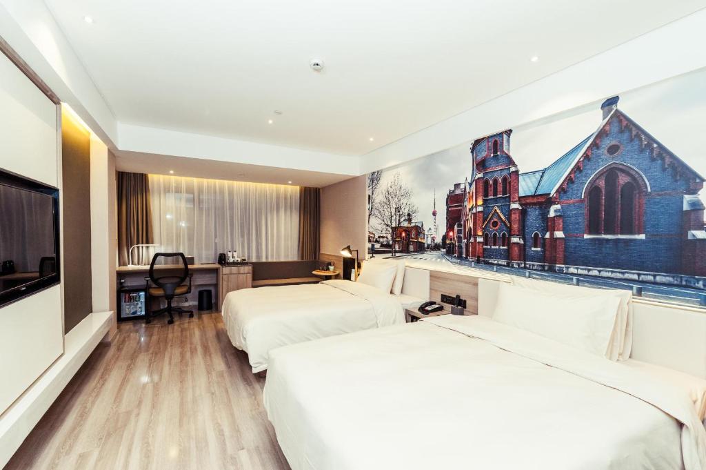 Postel nebo postele na pokoji v ubytování Atour Hotel Shanghai Pudong Airport