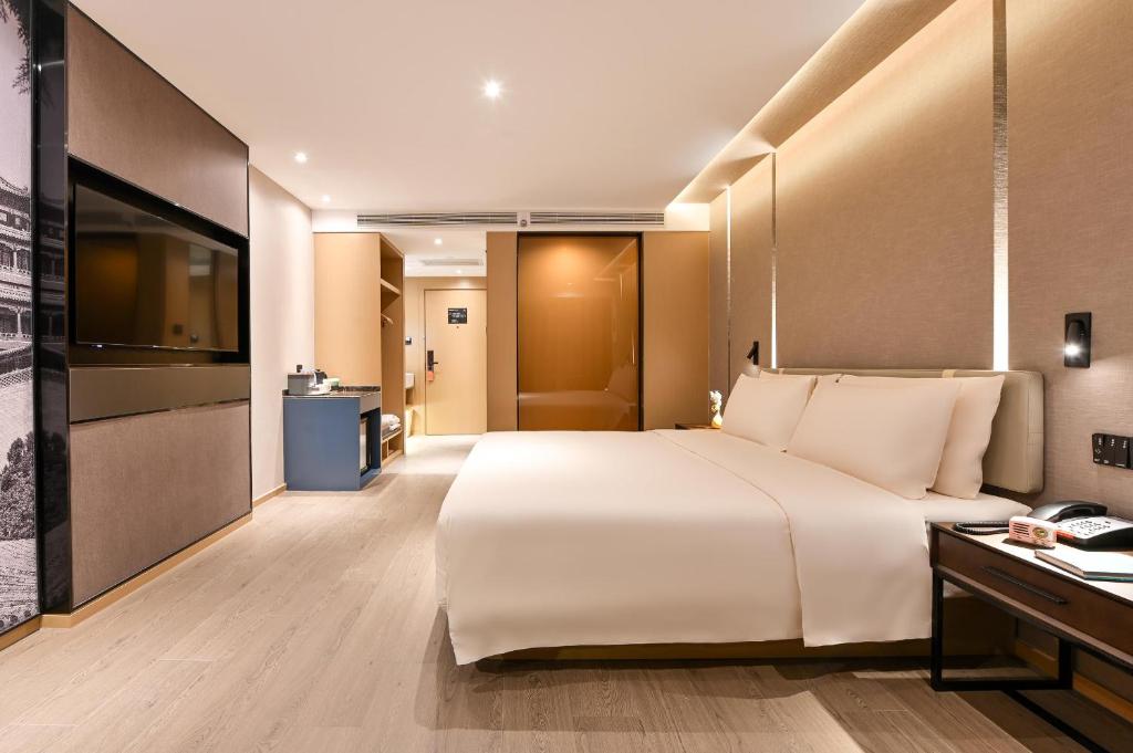Postel nebo postele na pokoji v ubytování Atour S Hotel Beijing Anzhen