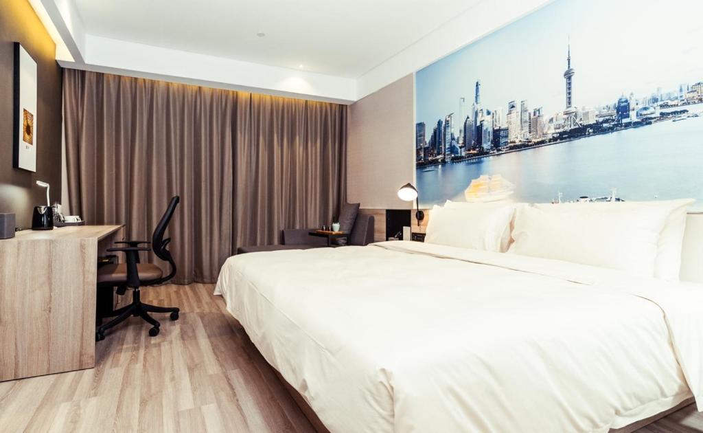Postel nebo postele na pokoji v ubytování Atour Hotel Shanghai Pudong Airport