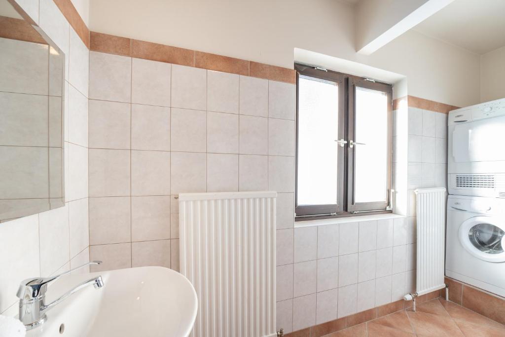 Koupelna v ubytování Appartementhaus Schmalzermoos
