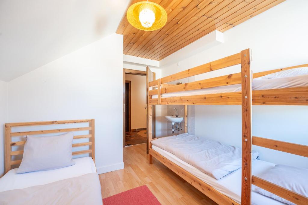 Postel nebo postele na pokoji v ubytování Appartementhaus Schmalzermoos