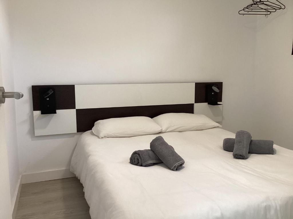 Posteľ alebo postele v izbe v ubytovaní Casa Torremar Playa de San Juan