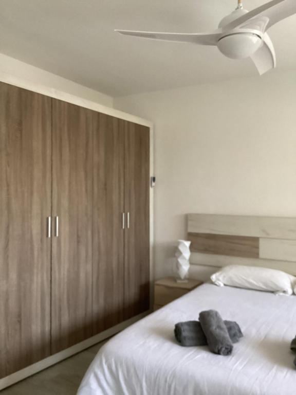 Posteľ alebo postele v izbe v ubytovaní Casa Torremar Playa de San Juan
