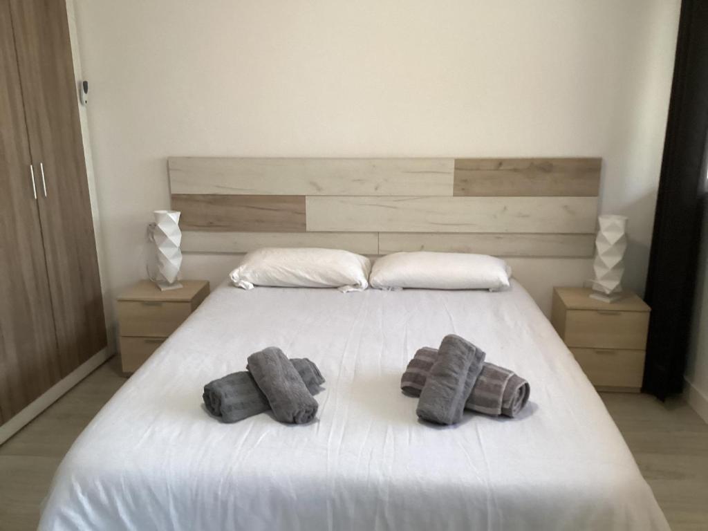 Posteľ alebo postele v izbe v ubytovaní Casa Torremar Playa de San Juan