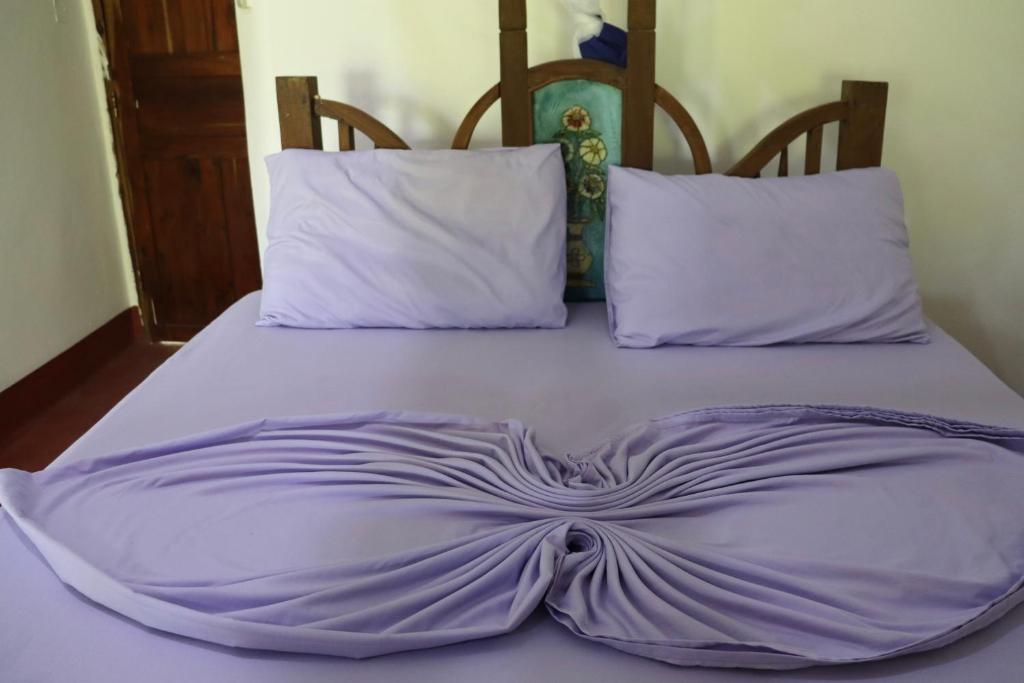 Postel nebo postele na pokoji v ubytování Embe Lodge