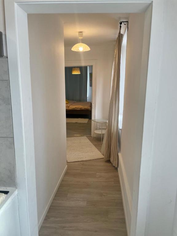 Postel nebo postele na pokoji v ubytování BLISS Basel Residence