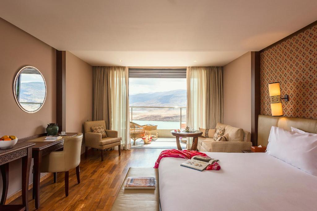 Een bed of bedden in een kamer bij Widiane Resort