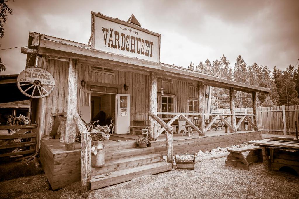 an old photo of a yankee rancher building at Western Farm Village in Boden