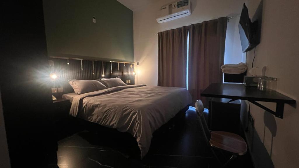 Katil atau katil-katil dalam bilik di GUEST INN HOTEL