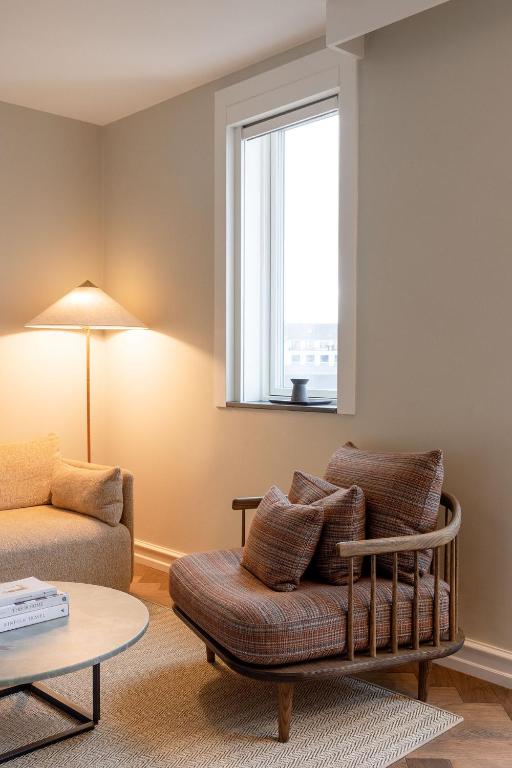 Posezení v ubytování Hypernym Hotel & Suites