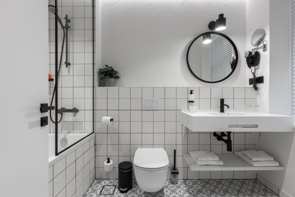 Koupelna v ubytování Konventa Sēta Hotel Keystone Collection