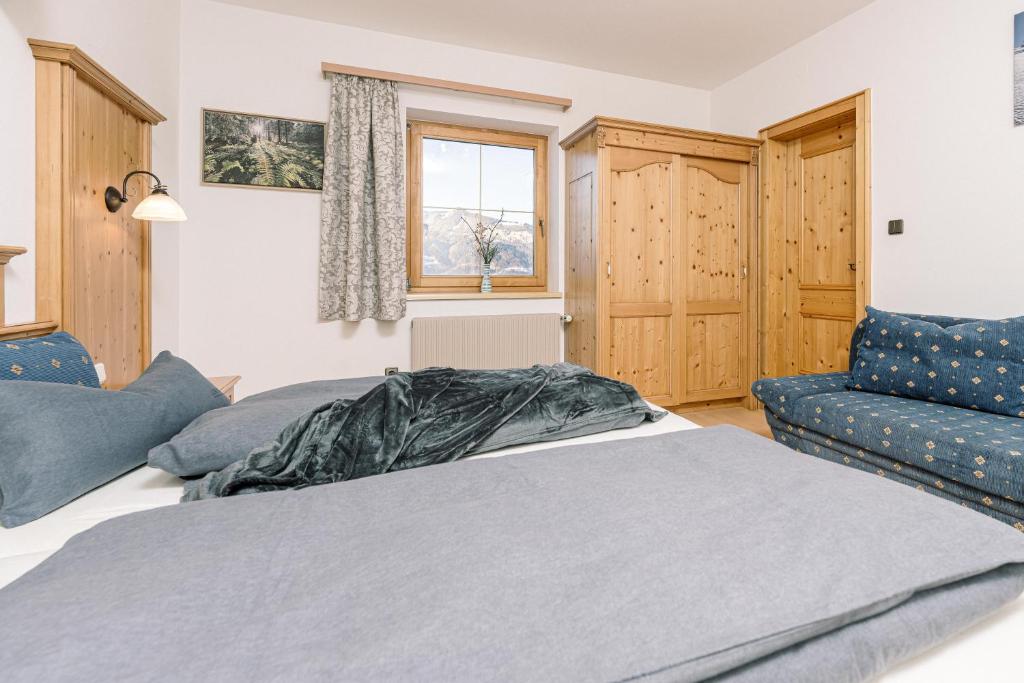 Postel nebo postele na pokoji v ubytování Landhaus Stieglschuster