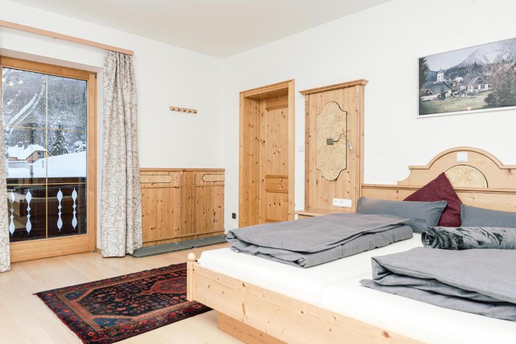 Postel nebo postele na pokoji v ubytování Landhaus Stieglschuster