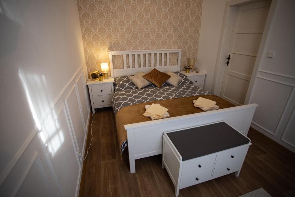 Postel nebo postele na pokoji v ubytování Resort Červený dvůr