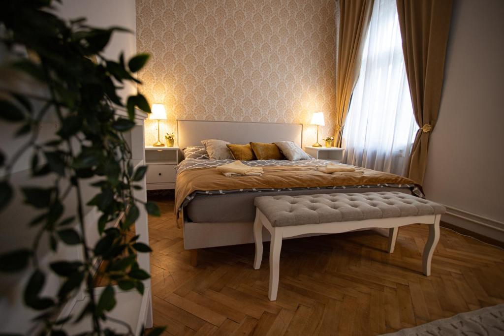Postel nebo postele na pokoji v ubytování Resort Červený dvůr